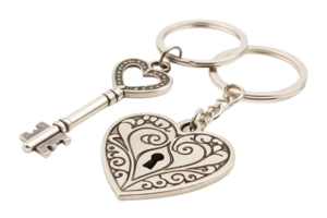 pair of matching heart shaped keychains featuring decorative key and heart with lock design, symbolizing love and connection png