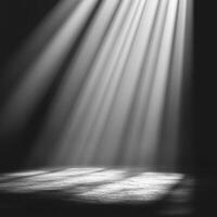 dramatic scene featuring beams of light illuminating dark space, creating captivating atmosphere. interplay of light and shadow evokes sense of mystery and depth photo