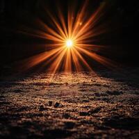 stunning sun flare illuminates ground, creating warm, golden glow against dark background. sparkling surface adds magical touch to serene atmosphere photo