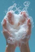 Washing hands with soap and bubbles creates refreshing and clean feeling. image captures essence of hygiene and care, emphasizing importance of cleanliness photo