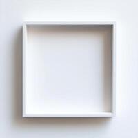 Minimal white frame with square shape, perfect for displaying art or photos. Its clean design enhances any decor, adding touch of elegance to your space photo