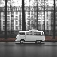 white van in motion, captured with blurred background of trees and buildings, evokes sense of speed and adventure photo