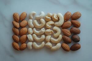 beautiful arrangement of various nuts including almonds, cashews, and walnuts, showcasing their unique shapes and colors. Perfect for healthy snacking or culinary use photo