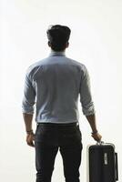 silhouette of man holding suitcase, dressed in button up shirt, ready for travel. image conveys sense of adventure and anticipation photo