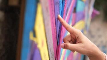 Immerse yourself in the vibrant colors of artistic expression conveyed through a delicate touch video