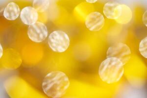 Golden bokeh lights creating warm ambiance with soft glow and dreamy atmosphere. photo