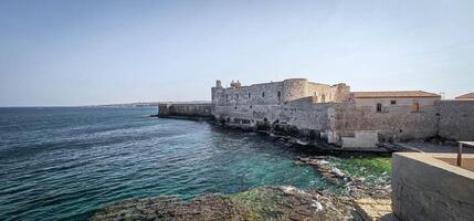 Maniace Castle on the island of Ortigia in Syracuse is one of the most important monuments of the Swabian period and one of the most famous Frederick II castles in the Sicilian summer of 2024 photo