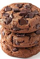 Deliciously stacked chocolate chip cookies fresh from the oven photo