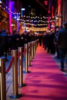 Elegant red carpet event with glowing lights and eager attendees photo