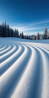 Beautiful winter landscape with smooth snow patterns on ski slope photo