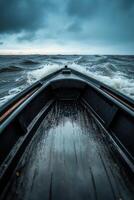 Rowboat navigating through turbulent waters at dusk near the shore photo