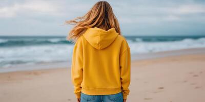 Walking along the beach with golden waves crashing nearby photo