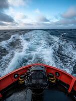 Bright morning on the water with waves trailing behind a boat photo