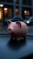 A pink piggy bank resting on a car dashboard during evening traffic photo