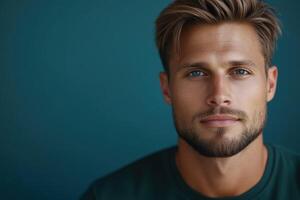 Close-up of a man with striking blue eyes and stylish hair indoors photo
