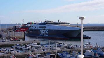 Bustling Port of Tarifa with DFDS Ferry and Atlantic Ocean View video