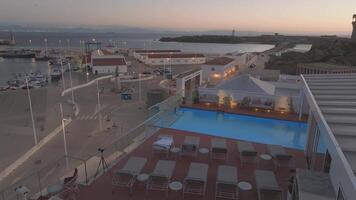 Aerial View of Tarifa Harbor and Lighthouse at Twilight video