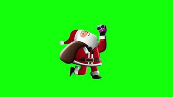 Happy Santa Claus playing with a gift, tossing it up and down while walking, on a green chroma key background video
