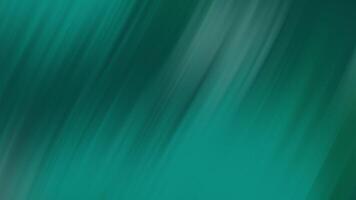 Animated of Teal diagonal streaks create a blurred backdrop ideal for digital designs, web backgrounds, presentations, social media graphics, and advertising. 4k animation video