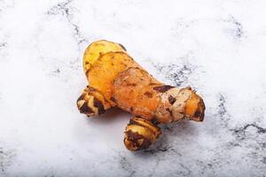 Fresh curcuma root for cooking photo