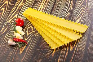 Uncooked raw Lasagna dry sheets photo