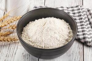 Wheat flour heap for bake photo
