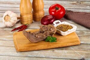 Steamed pork tongue with mustard photo