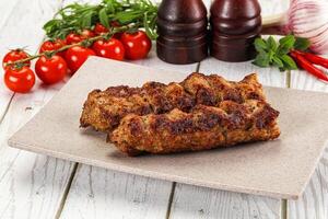 Chicken kebab minced meat and spices photo