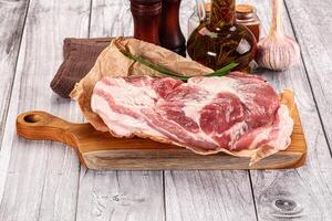 Raw pork shoulder for cooking photo