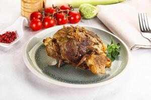 Baked Lamb shank with bone photo