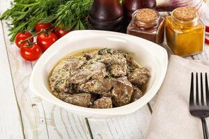 Roasted chicken liver with cream photo