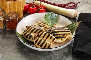 Grilled squid in the plate photo