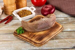 Steamed pork tongue with mustard photo