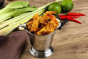 Golden deep prawn tempura wuth sauce photo