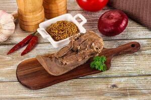 Steamed pork tongue with mustard photo