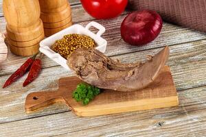 Steamed pork tongue with mustard photo