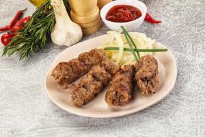 Beef kebab minced meat with onion photo