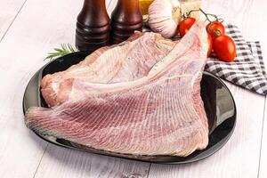 Raw uncooked stingray fish wing photo