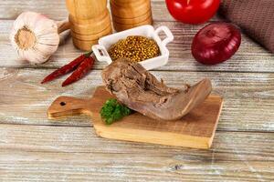 Steamed pork tongue with mustard photo