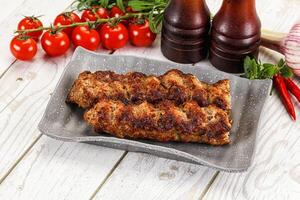 Chicken kebab minced meat and spices photo