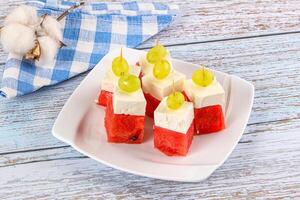 Watermelon with feta and grape photo