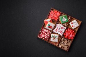 Homemade Christmas gingerbread cookies made as sweets photo