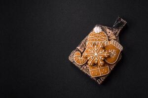 Homemade Christmas gingerbread cookies made as sweets photo
