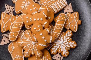 Homemade Christmas gingerbread cookies made as sweets photo