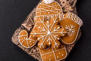 Homemade Christmas gingerbread cookies made as sweets photo