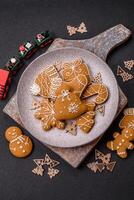 Homemade Christmas gingerbread cookies made as sweets photo
