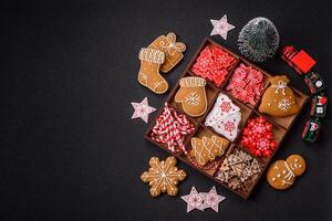 Homemade Christmas gingerbread cookies made as sweets photo