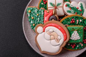 Homemade Christmas gingerbread cookies made as sweets photo