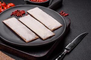 Rectangular whole grain crisp bread with cream cheese photo