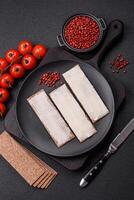 Rectangular whole grain crisp bread with cream cheese photo